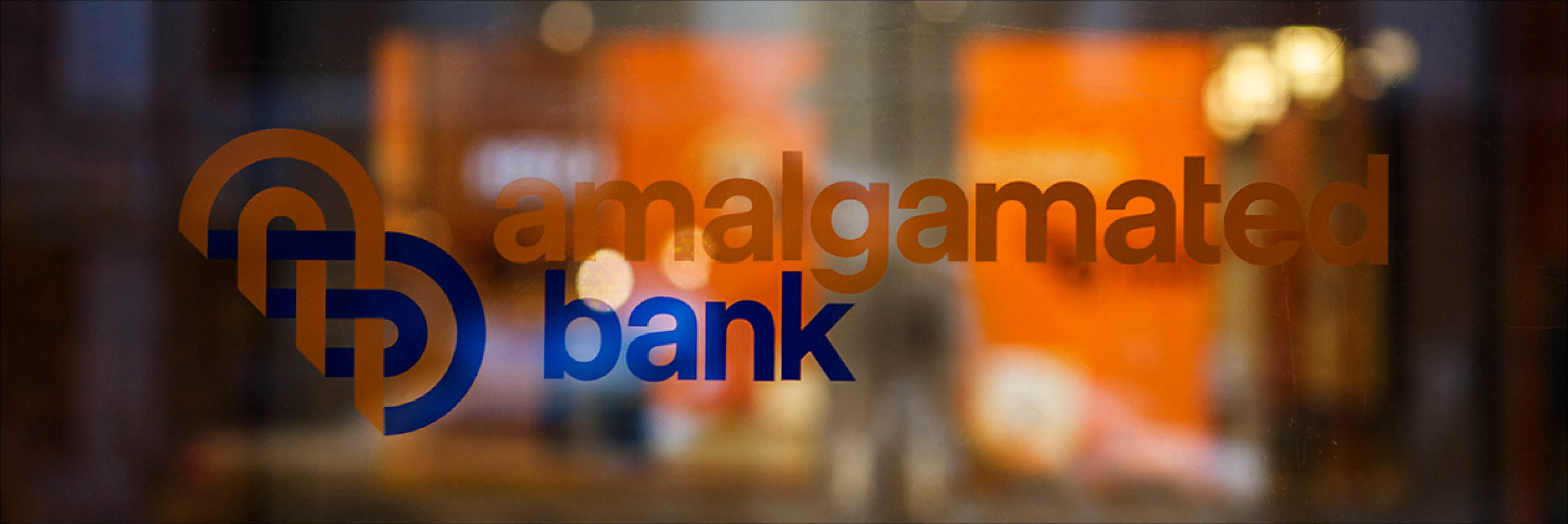 Amalgamated Bank logo on glass 